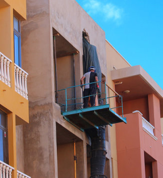 Worker at apartment building